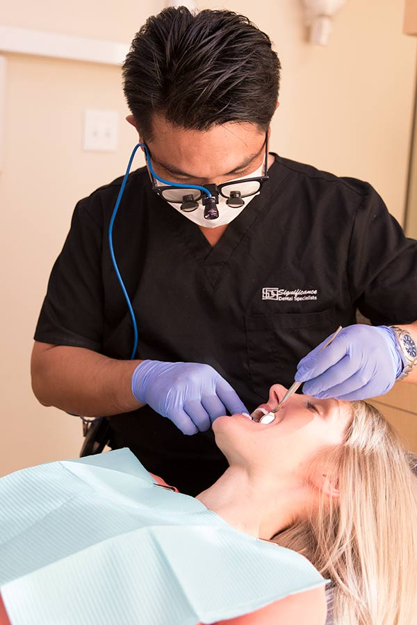 dentist performing procedure - Las Vegas, NV